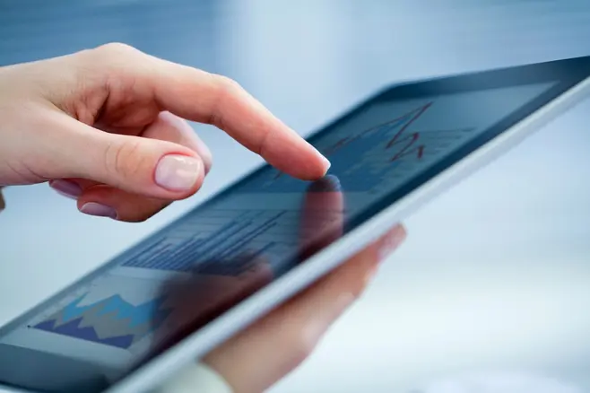 Hands using a tablet